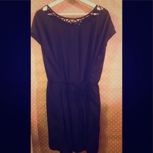 Black rayon dress with interesting neckline..